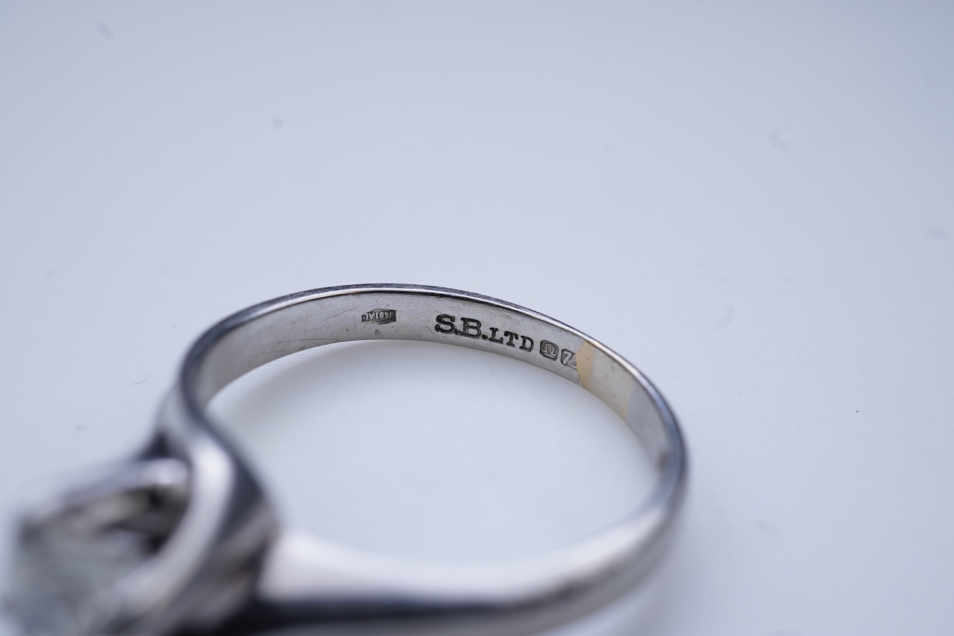 A diamond solitaire ring